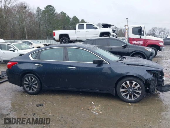 2016 Nissan Altima SR with VIN 1N4AL3AP0GC165604, listed as a IAAI auction lot 41755313 with 201,692 mi miles and . Bid and sale history available at DreamBid. Image 14.
