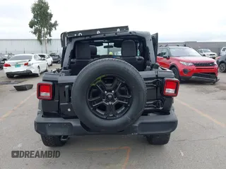 2018 Jeep Wrangler Unlimited Sport S with VIN 1C4HJXDG8JW105612, listed as a IAAI auction lot 42420765 with 54,873 mi miles and . Bid and sale history available at DreamBid. Image 15.