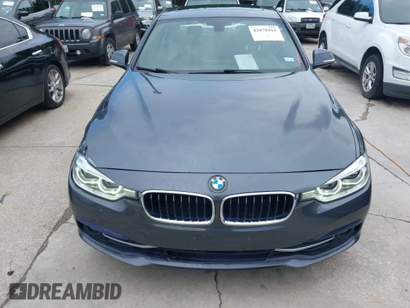 2018 BMW 3 Series 330i xDrive with VIN WBA8D9C55JEM32703, listed as a IAAI auction lot 42478412 with 79,000 mi miles and . Bid and sale history available at DreamBid. Image 6.