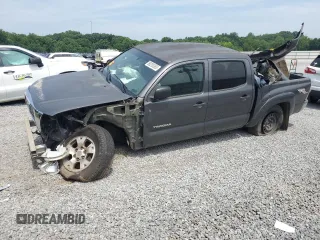 2010 Toyota Tacoma PreRunner with VIN 5TEJU4GN7AZ711911, listed as a Copart auction lot 60200385 with 209,579 mi miles and Salvage title. Bid and sale history available at DreamBid. Image 1.