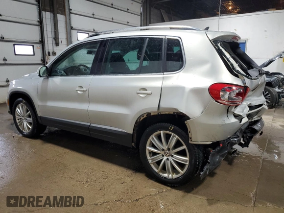 2013 Volkswagen Tiguan SE z VIN WVGBV3AX1DW579506, wystawiony jako Copart lot #52719575 z przebiegiem 163 471 mil mil oraz Szkoda całkowita • Salvage title. Historia ofert i sprzedaży dostępna na DreamBid. Obrazek 2.