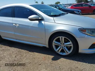 2010 Volkswagen CC Sport with VIN WVWMP7ANXAE558605, listed as a IAAI auction lot 41855410 with 175,307 mi miles and . Bid and sale history available at DreamBid. Image 6.