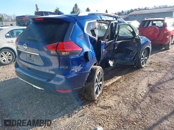 2017 Nissan Rogue SV with VIN 5N1AT2MV5HC858874, listed as a IAAI auction lot 41860634 with Not Provided miles. Bid and sale history available at carsss.com. Image 4.
