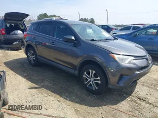 2017 Toyota RAV4 LE with VIN 2T3ZFREV9HW390859, listed as a IAAI auction lot 41802727 with 167,085 mi miles and . Bid and sale history available at carsss.com. Image 1.