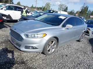 2015 Ford Fusion SE with VIN 3FA6P0H98FR267586, listed as a IAAI auction lot 41987958 with 136,919 mi miles. Bid and sale history available at carsss.com. Image 18.