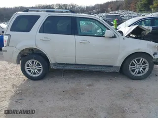 2010 Mercury Mariner Premier with VIN 4M2CN8HG3AKJ15125, listed as a IAAI auction lot 41440858 with 1 mi miles. Bid and sale history available at carsss.com. Image 13.