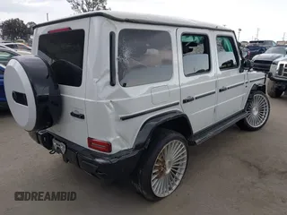 2023 Mercedes-Benz G G 550 with VIN W1NYC6BJ0PX490548, listed as a IAAI auction lot 41959564 with 43,700 mi miles. Bid and sale history available at carsss.com. Image 4.