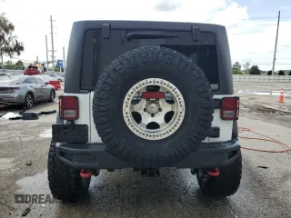 2018 Jeep Wrangler JK Unlimited Rubicon Recon with VIN 1C4BJWFG8JL816211, listed as a Copart auction lot 71461564 with 41,576 mi miles and Salvage Title. Bid and sale history available at carsss.com. Image 6.