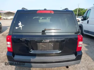 2014 Jeep Patriot Sport with VIN 1C4NJPBA3ED720412, listed as a IAAI auction lot 42390785 with 215,446 mi miles and . Bid and sale history available at DreamBid. Image 16.