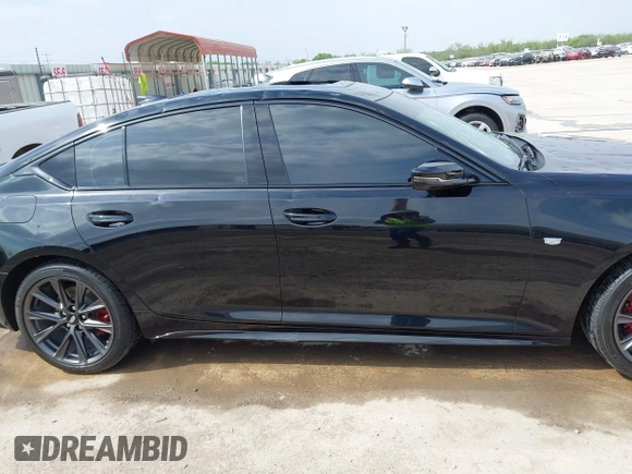 2024 Cadillac CT5 Sport z VIN 1G6DP5RK8R0102340, wystawiony jako IAAI lot #41943414 z przebiegiem 13 488 mil mil oraz . Historia ofert i sprzedaży dostępna na DreamBid. Obrazek 13.