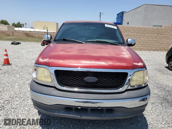 2001 Ford F-150 XLT с VIN 1FTRW07L01KF03457, выставлен на аукционе Copart как лот 60086725 с пробегом 205 917 миль миль и Списание • Salvage title. История ставок и продаж доступна на DreamBid. Изображение 5.