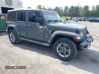 2018 Jeep Wrangler Unlimited Sahara z VIN 1C4HJXEN8JW329816, wystawiony jako IAAI lot #42055851 z przebiegiem 70 298 mil mil oraz . Historia ofert i sprzedaży dostępna na DreamBid. Obrazek 1.