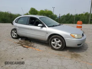 2004 Ford Taurus SES with VIN 1FAFP55S74G119390, listed as a Copart auction lot 60631865 with Not provided miles and Salvage title. Bid and sale history available at DreamBid. Image 4.