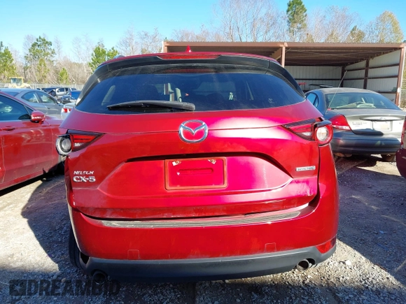 2020 Mazda CX-5 Grand Touring with VIN JM3KFADM8L0846818, listed as a IAAI auction lot 41224843 with 123,554 mi miles. Bid and sale history available at carsss.com. Image 17.