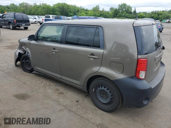 2012 Scion xB z VIN JTLZE4FE1CJ014494, wystawiony jako Copart lot #57779675 z przebiegiem 151 857 mil mil oraz Szkody całkowita. Historia ofert i sprzedaży dostępna na DreamBid. Obrazek 2.