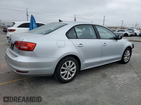 2015 Volkswagen Jetta SE with VIN 3VWD17AJ5FM285618, listed as a Copart auction lot 59930985 with 146,382 mi miles and Salvage title. Bid and sale history available at DreamBid. Image 3.