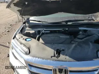 2020 Honda Pilot Touring 8-Passenger z VIN 5FNYF6H90LB022156, wystawiony jako Copart lot #49451465 z przebiegiem 59 544 mil mil oraz Szkoda całkowita • Salvage title. Historia ofert i sprzedaży dostępna na DreamBid. Obrazek 14.