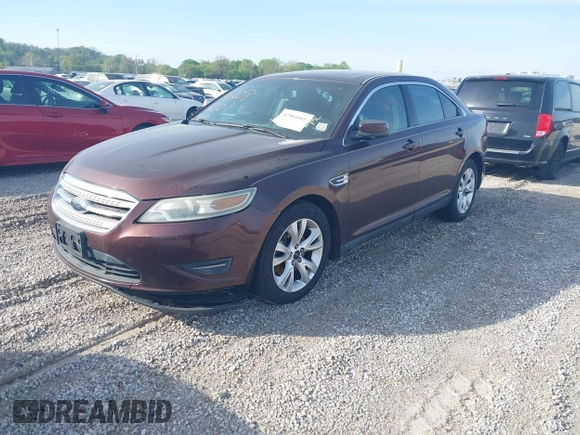 2010 Ford Taurus SEL с VIN 1FAHP2EW2AG142484, выставлен на аукционе IAAI как лот 42084001 с пробегом 185 022 миль миль и . История ставок и продаж доступна на DreamBid. Изображение 2.