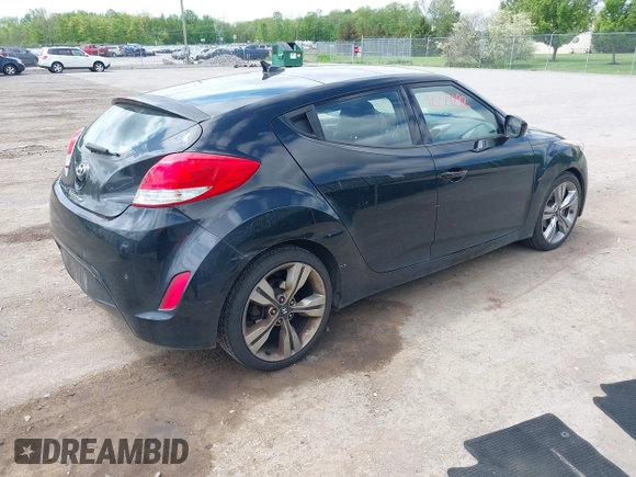 2013 Hyundai Veloster w/Black Int с VIN KMHTC6AD5DU084996, выставлен на аукционе IAAI как лот 42279292 с пробегом 179 460 миль миль и . История ставок и продаж доступна на DreamBid. Изображение 4.
