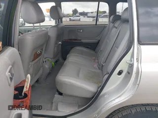 2006 Toyota Highlander z VIN JTEDW21A160001634, wystawiony jako IAAI lot #41899340 z przebiegiem Nie podano mil oraz . Historia ofert i sprzedaży dostępna na DreamBid. Obrazek 8.