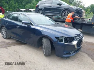 2022 Mazda 3 Premium with VIN 3MZBPADLXNM301066, listed as a IAAI auction lot 42371150 with 28,125 mi miles and . Bid and sale history available at DreamBid. Image 1.