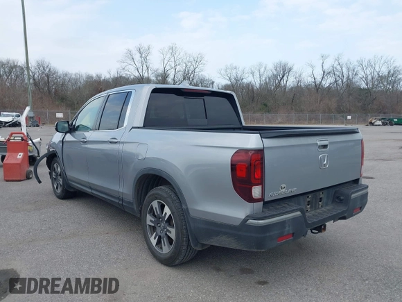 2019 Honda Ridgeline RTL with VIN 5FPYK2F50KB004055, listed as a IAAI auction lot 41576975 with 128,620 mi miles and . Bid and sale history available at DreamBid. Image 3.