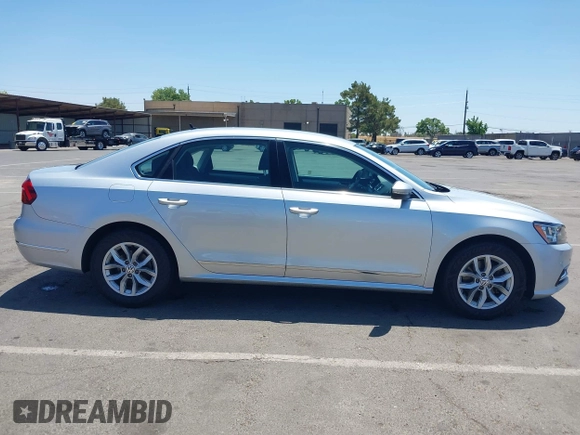2017 Volkswagen Passat S with VIN 1VWAT7A32HC009657, listed as a IAAI auction lot 42541472 with 100,026 mi miles and . Bid and sale history available at DreamBid. Image 13.