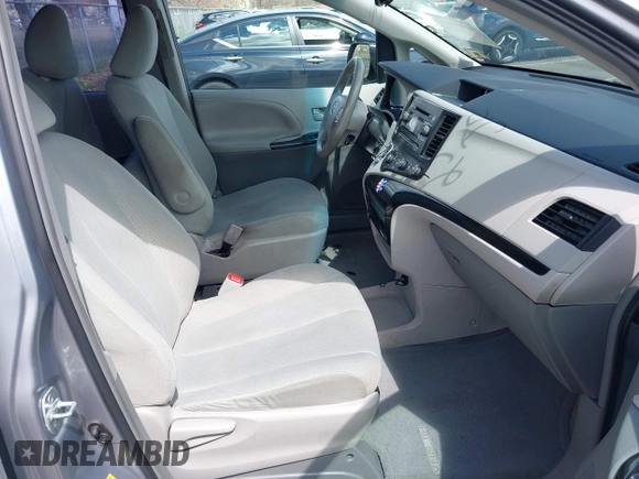 2013 Toyota Sienna L with VIN 5TDZK3DC9DS298333, listed as a IAAI auction lot 41941011 with 141,021 mi miles. Bid and sale history available at carsss.com. Image 5.