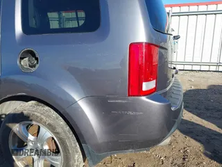 2015 Honda Pilot EX-L with VIN 5FNYF4H59FB060023, listed as a IAAI auction lot 41327793 with 197,981 mi miles and . Bid and sale history available at carsss.com. Image 6.