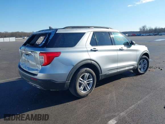 2022 Ford Explorer XLT with VIN 1FMSK8DH2NGA63497, listed as a IAAI auction lot 41866580 with 54,616 mi miles. Bid and sale history available at carsss.com. Image 4.