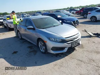 2017 Honda Civic LX with VIN 19XFC2F58HE002520, listed as a IAAI auction lot 42028700 with 143,770 mi miles and . Bid and sale history available at DreamBid. Image 1.