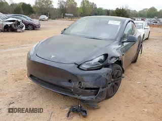 2024 Tesla Model Y with VIN 7SAYGDED3RA303113, listed as a IAAI auction lot 41915760 with 12,917 mi miles and . Bid and sale history available at DreamBid. Image 2.