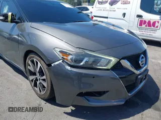2018 Nissan Maxima Platinum z VIN 1N4AA6AP1JC388815, wystawiony jako IAAI lot #42098902 z przebiegiem 80 677 mil mil oraz . Historia ofert i sprzedaży dostępna na DreamBid. Obrazek 6.