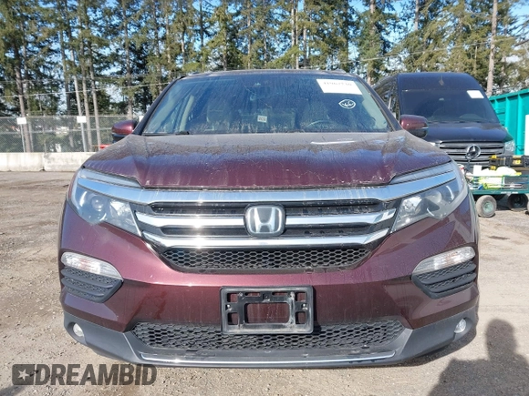 2016 Honda Pilot Touring with VIN 5FNYF6H99GB094933, listed as a IAAI auction lot 41967730 with 98,841 mi miles. Bid and sale history available at carsss.com. Image 12.