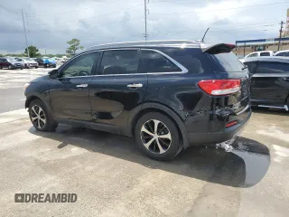 2016 Kia Sorento EX with VIN 5XYPH4A19GG005627, listed as a Copart auction lot 63580745 with 174,611 mi miles and Salvage title. Bid and sale history available at DreamBid. Image 2.