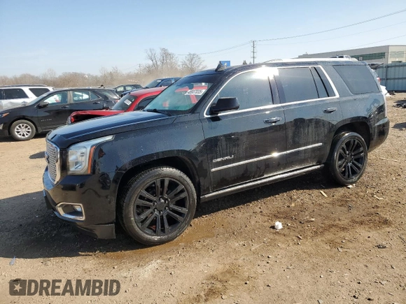 2016 GMC Yukon Denali with VIN 1GKS2CKJ9GR301628, listed as a Copart auction lot 48937035 with 121,863 mi miles and Salvage Title. Bid and sale history available at carsss.com. Image 1.