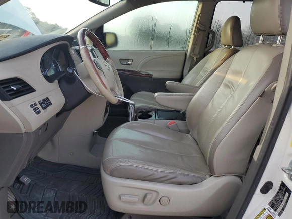 2011 Toyota Sienna XLE with VIN 5TDDK3DC1BS011963, listed as a Copart auction lot 54951565 with 196,868 mi miles and Salvage title. Bid and sale history available at DreamBid. Image 7.