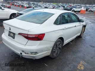 2021 Volkswagen Jetta SEL with VIN 3VWE57BU0MM011337, listed as a IAAI auction lot 41307039 with 54,306 mi miles and . Bid and sale history available at DreamBid. Image 4.