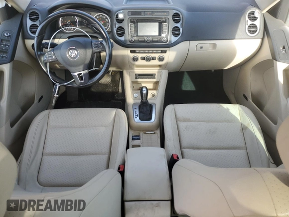 2014 Volkswagen Tiguan SE with VIN WVGAV3AX9EW038118, listed as a Copart auction lot 56329625 with 134,620 mi miles and Salvage title. Bid and sale history available at DreamBid. Image 8.