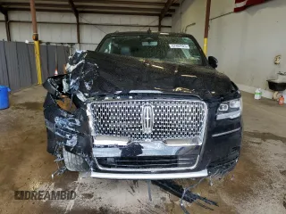2024 Lincoln Navigator Reserve z VIN 5LMJJ3LG8REL11292, wystawiony jako Copart lot #57487925 z przebiegiem 29 200 mil mil oraz Szkoda całkowita • Salvage title. Historia ofert i sprzedaży dostępna na DreamBid. Obrazek 5.