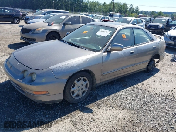 1996 Acura Integra LS z VIN JH4DB7658TS000018, wystawiony jako IAAI lot #42466253 z przebiegiem 191 795 mil mil oraz . Historia ofert i sprzedaży dostępna na DreamBid. Obrazek 2.