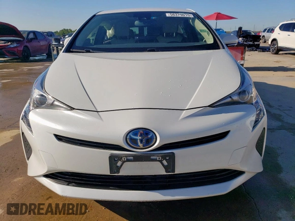 2017 Toyota Prius Two z VIN JTDKARFUXH3038947, wystawiony jako Copart lot #56379015 z przebiegiem 64 230 mil mil oraz Szkoda całkowita • Salvage title. Historia ofert i sprzedaży dostępna na DreamBid. Obrazek 5.
