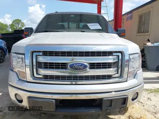 2013 Ford F-150 XL z VIN 1FTFW1CTXDKG41882, wystawiony jako IAAI lot #42680624 z przebiegiem 243 505 mil mil oraz . Historia ofert i sprzedaży dostępna na DreamBid. Obrazek 13.