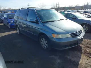 2002 Honda Odyssey EX-L z VIN 5FNRL180X2B022889, wystawiony jako IAAI lot #41546405 z przebiegiem 162 395 mil mil oraz . Historia ofert i sprzedaży dostępna na DreamBid. Obrazek 1.