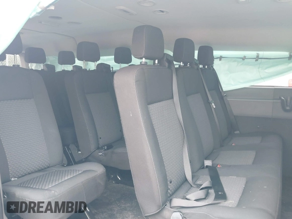 2023 Ford Transit Passenger XL with VIN 1FBAX9Y83PKC08567, listed as a IAAI auction lot 39883261 with 15,028 mi miles and . Bid and sale history available at DreamBid. Image 8.