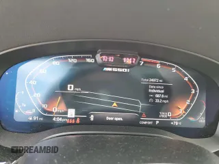 2023 BMW 5 Series M550i xDrive with VIN WBA13BK06PCM31937, listed as a Copart auction lot 66490494 with 24,972 mi miles and Salvage title. Bid and sale history available at DreamBid. Image 9.