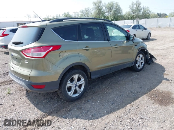 2013 Ford Escape SE with VIN 1FMCU9GX0DUA54515, listed as a IAAI auction lot 42330534 with 113,484 mi miles and . Bid and sale history available at DreamBid. Image 4.