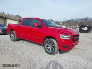 2021 Ram 1500 Laramie with VIN 1C6SRFJT5MN716600, listed as a IAAI auction lot 41820505 with 92,305 mi miles. Bid and sale history available at carsss.com. Image 1.