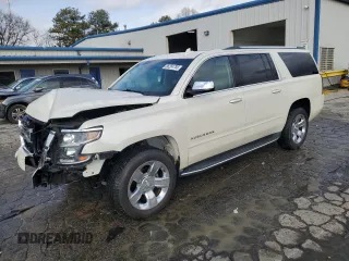 2015 Chevrolet Suburban LTZ with VIN 1GNSCKKC3FR709536, listed as a Copart auction lot 88204785 with 132,655 mi miles and Salvage Title. Bid and sale history available at DreamBid. Image 1.
