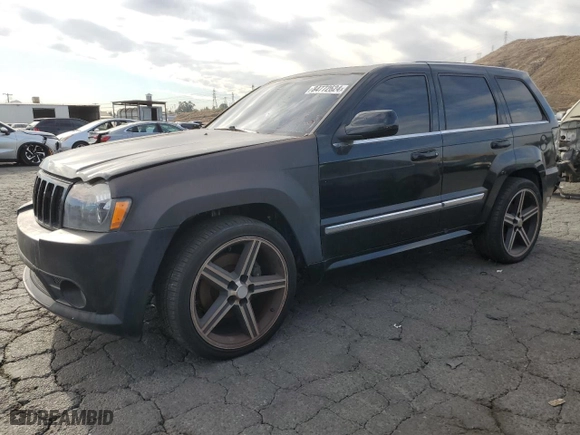 2007 Jeep Grand Cherokee SRT-8 with VIN 1J8HR78357C502665, listed as a Copart auction lot 84772624 with 153,311 mi miles and Clean Title. Bid and sale history available at carsss.com. Image 1.